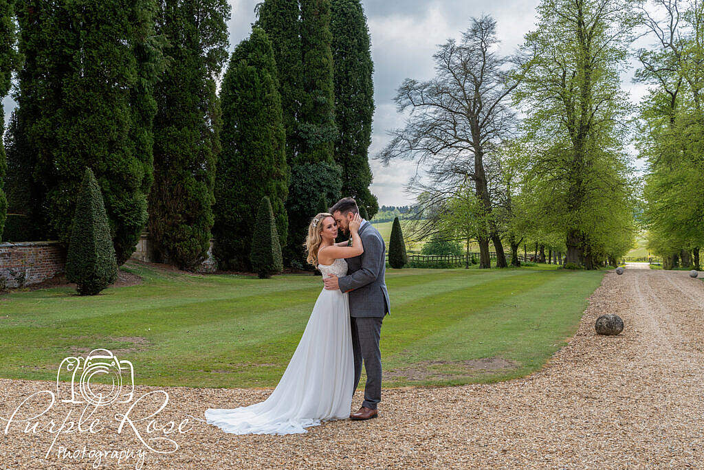 Bride and groom embracing