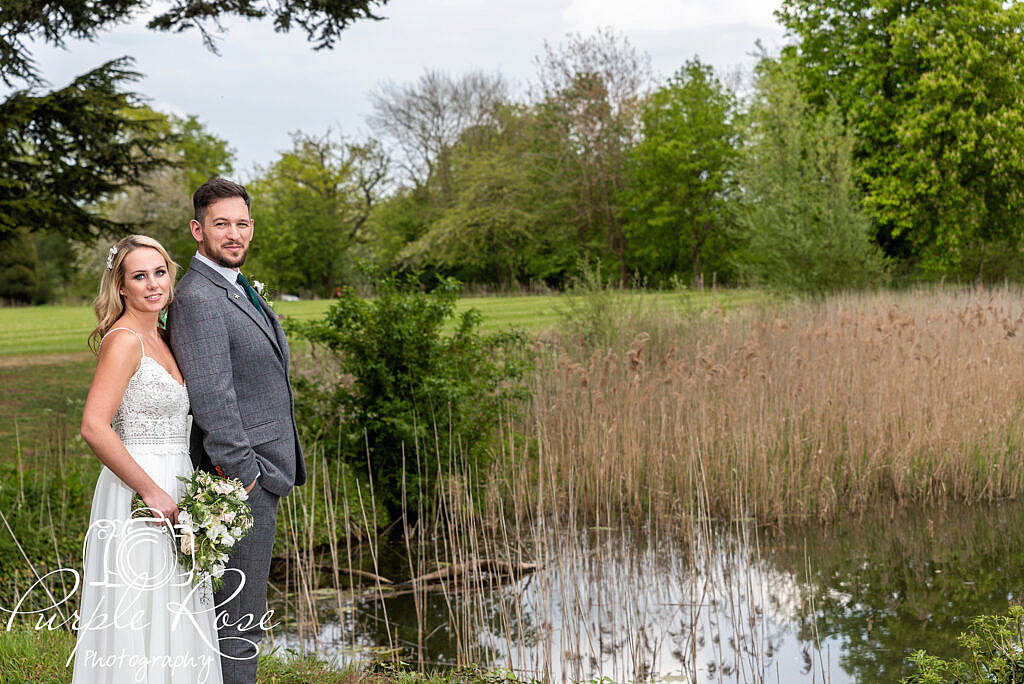 Bride and groom posing for a photo