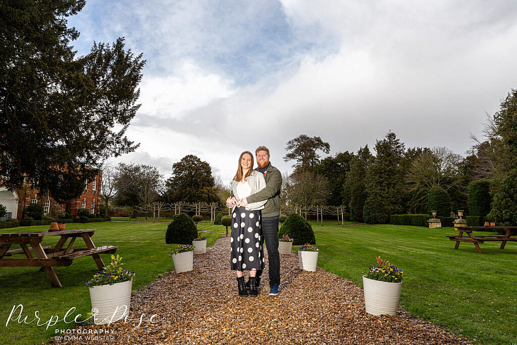 Couple standing in a garden