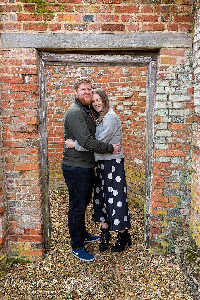 Couple standing in a doorway