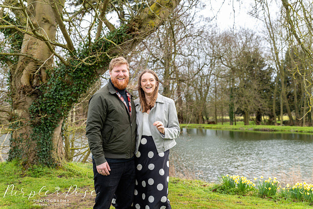 Couple laughing by daffodils