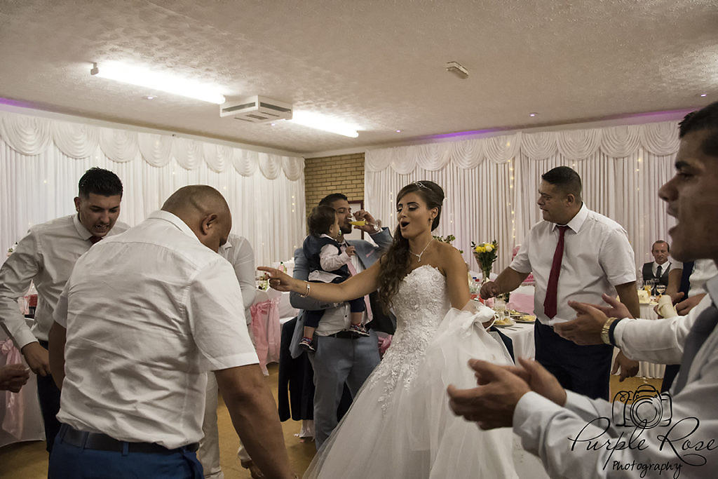 Bride dancing with her guests