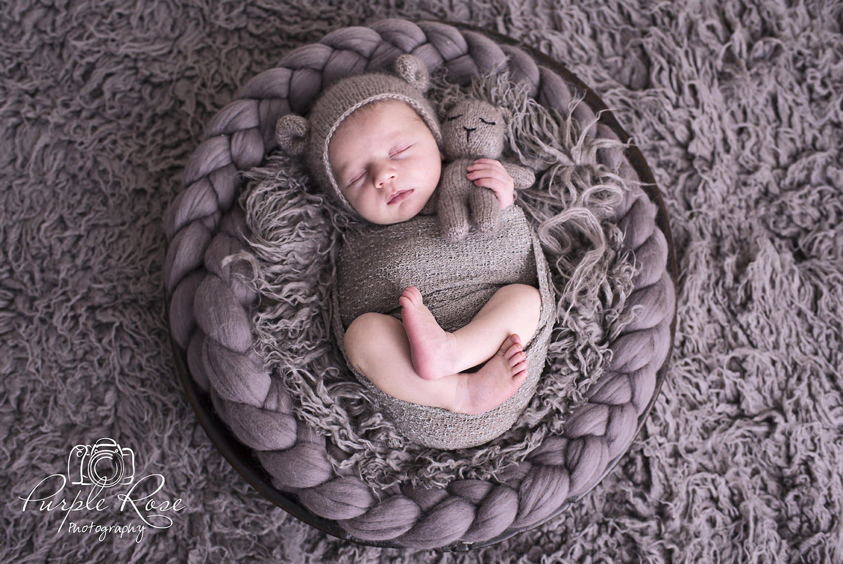 Baby sleeping in a bowl