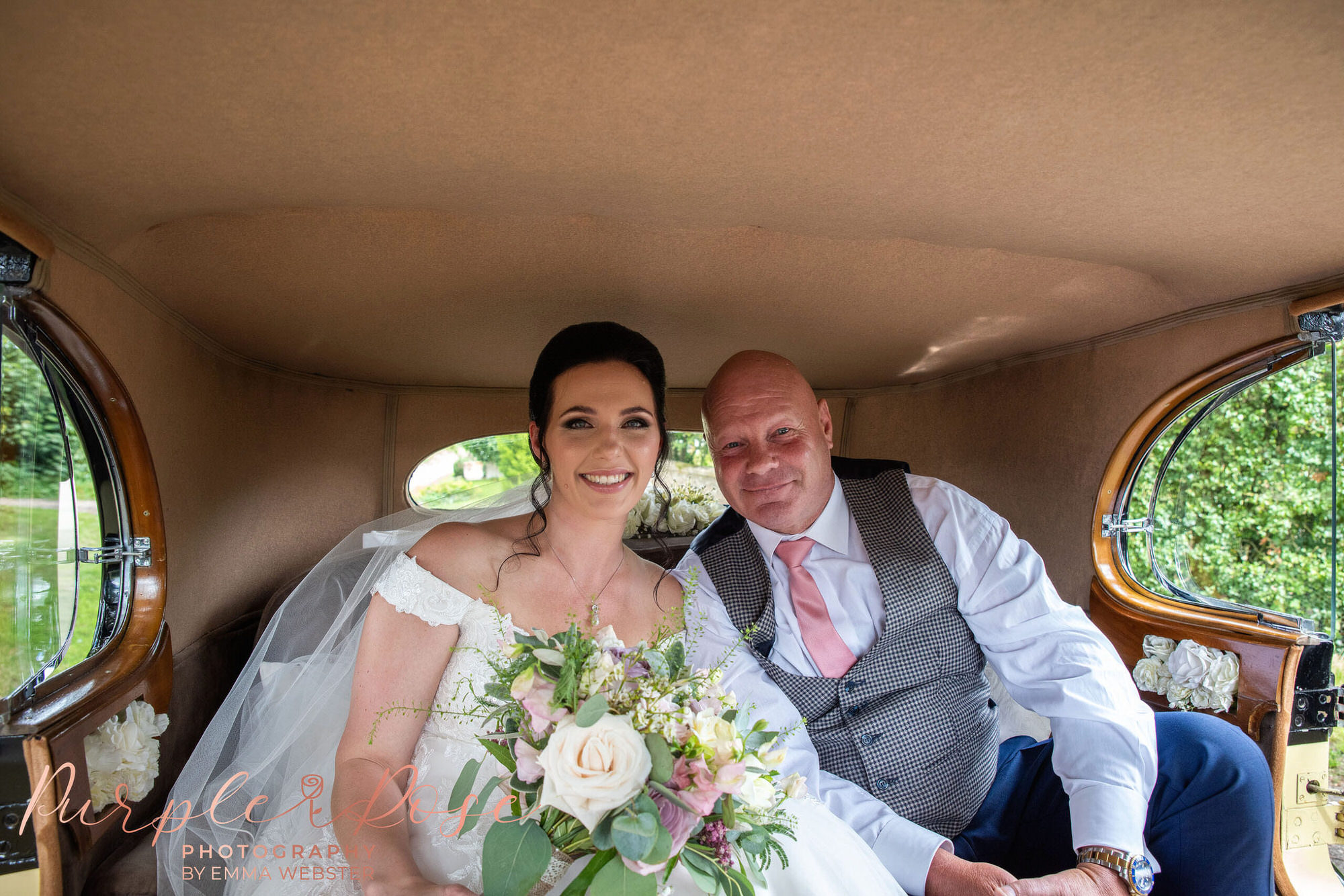 Bride waiting in the car fo rher wedding ceremony