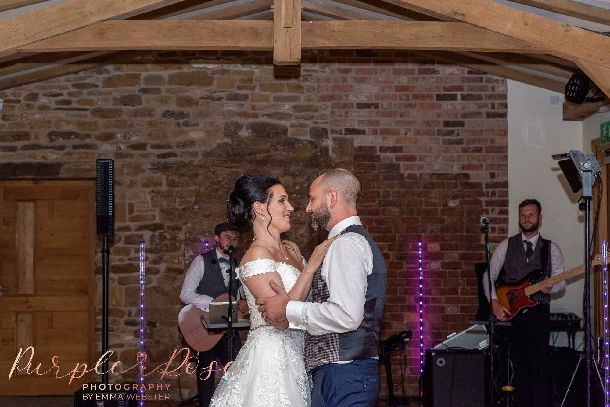 Bride and groom enjoying their 1st dance