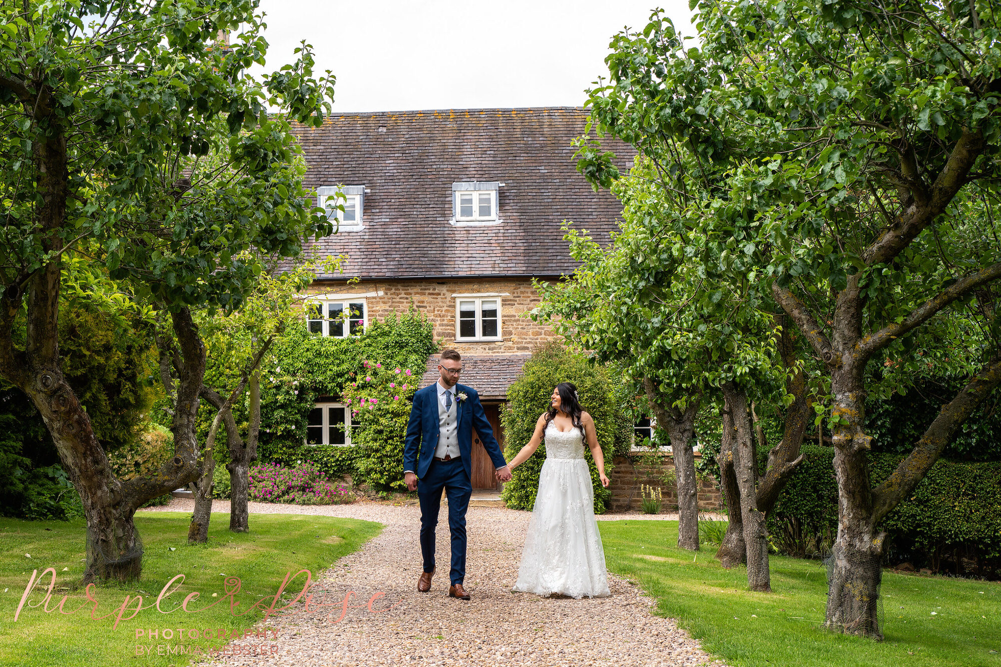 Bride and groom strolling on their wedding day