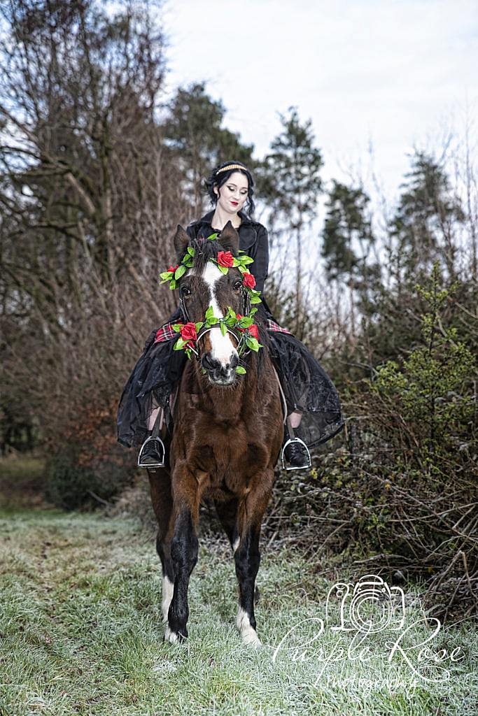 Gothic lady riding a horse