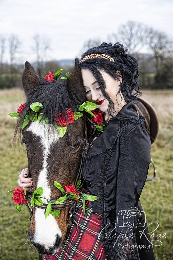 Gothic lady riding a horse