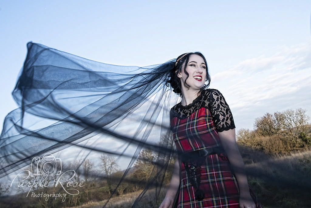 Gothic bride with black wedding veil