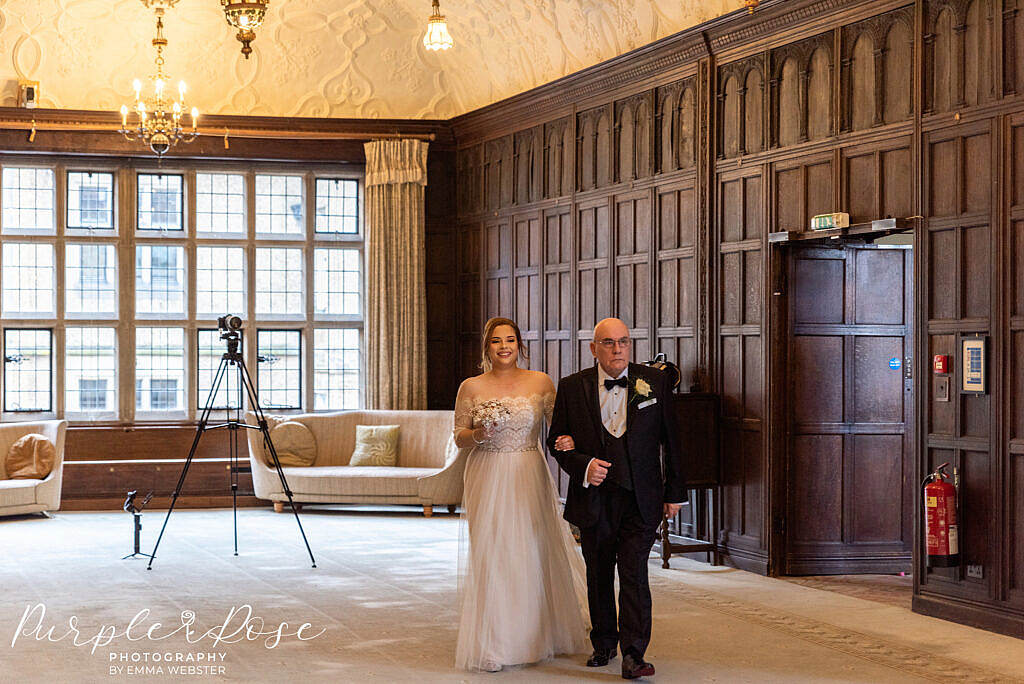 Bride walking into the ceremony with her father