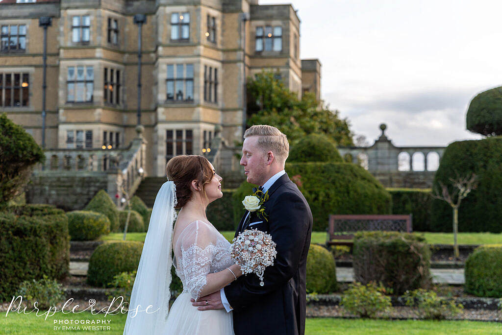 Bride and groom in the grounds of Farnham hall