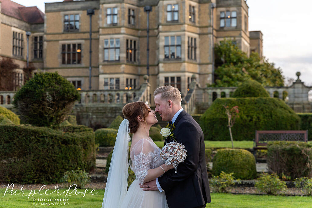 Bride and groom outside their wedding venue