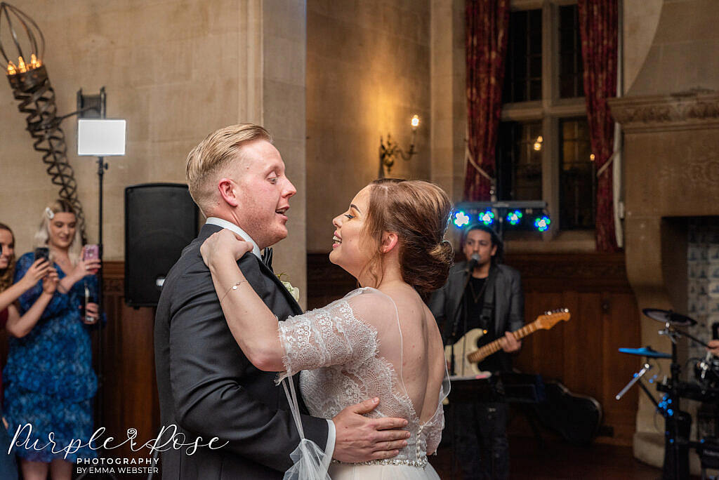 bride and groom dancing together