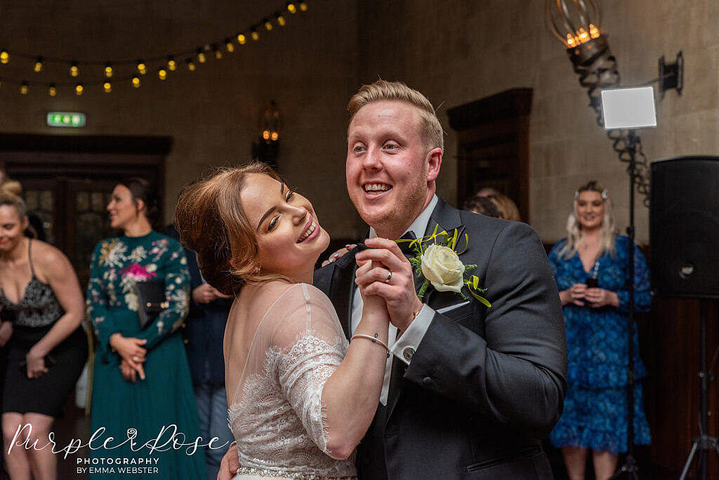 bride and groom enjoying their first dance