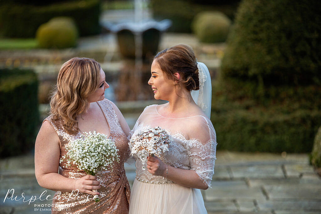 Bride looking at her bridesmaid