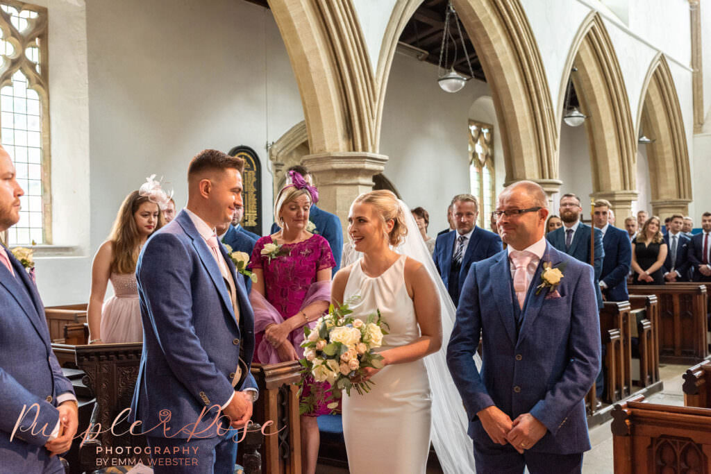 Bride meeting her groom inside the church