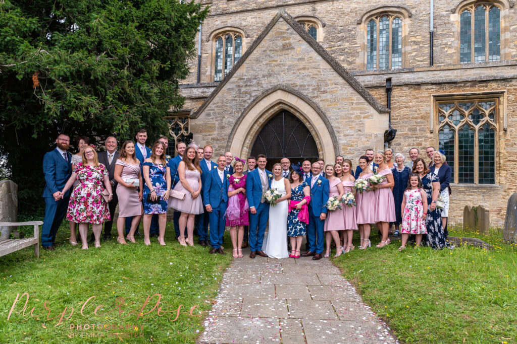 Big group photo after church wedding