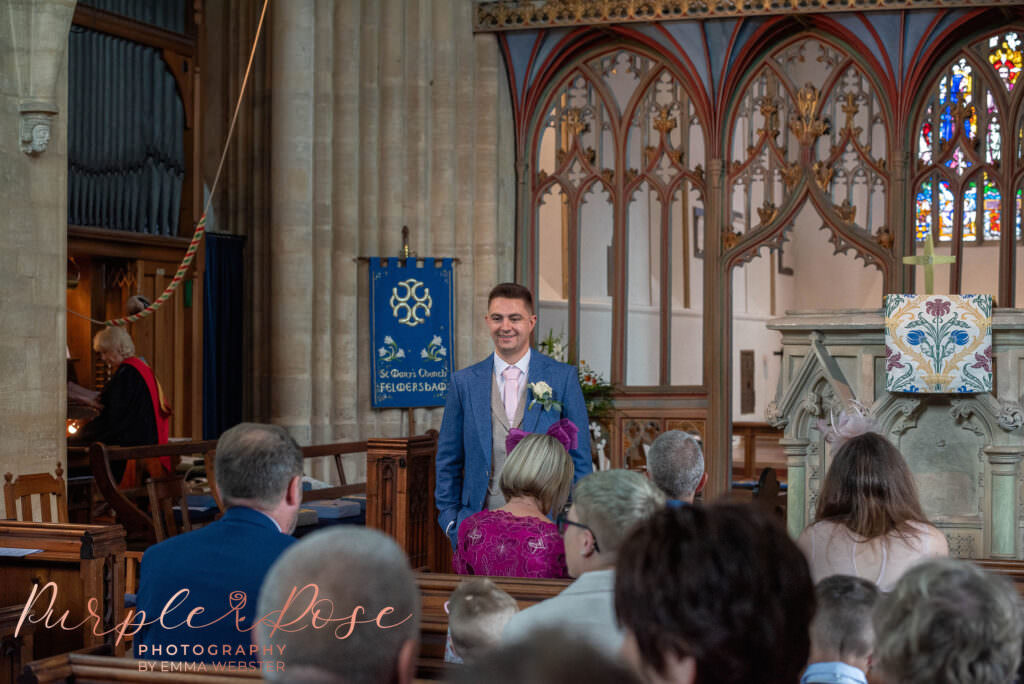 Groom waiting in the church for his bride to arrive