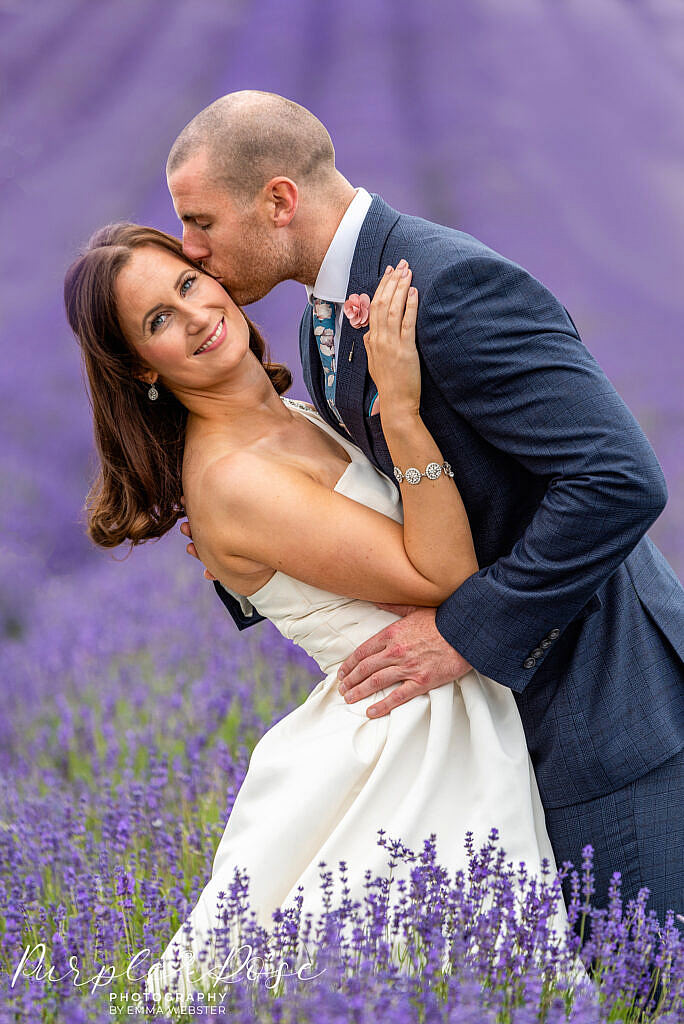 Bride and groom in a lavender field