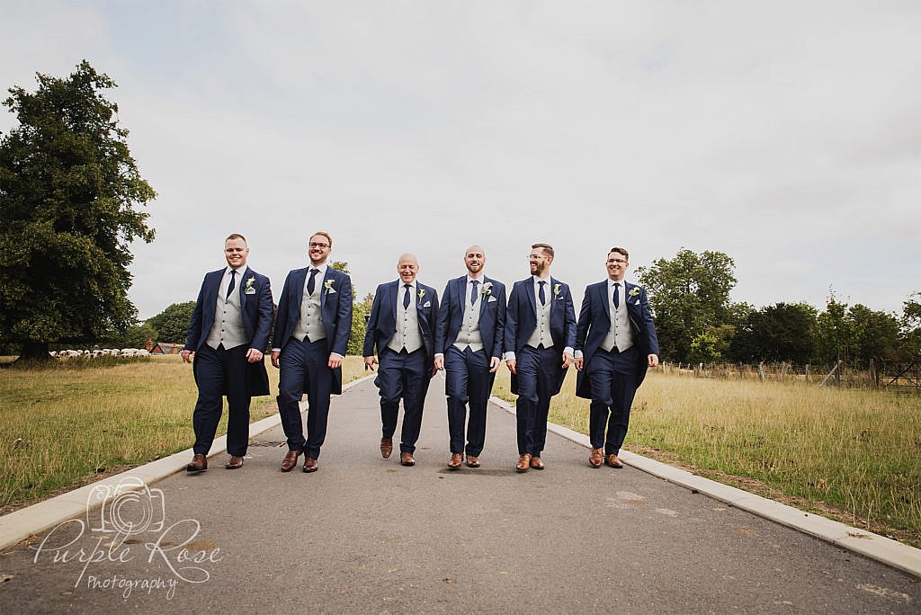 Groomsmen walking to the wedding