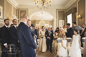 Bride walking towards her groom