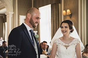 Bride and groom laughing