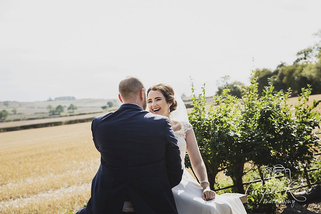 Bride and groom laughing