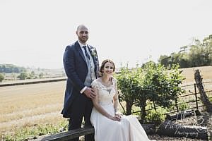 Bride sitting on a bench