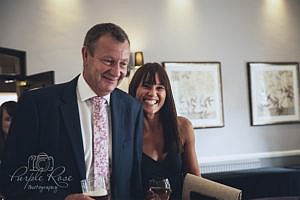 Smiling wedding guests