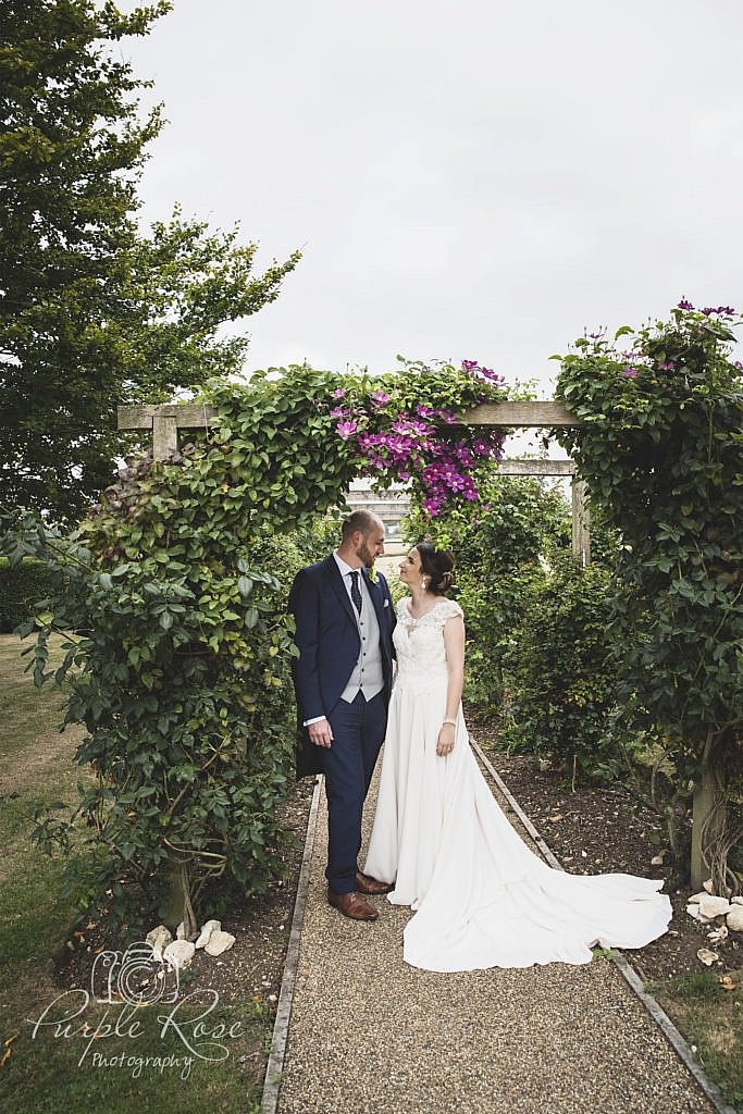 Bride and groom looking into each others eyes