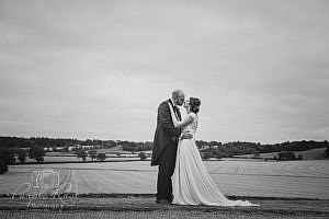 Bride and groom kissing