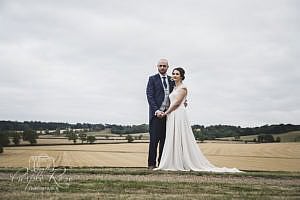 Bride and groom looking towards the distance