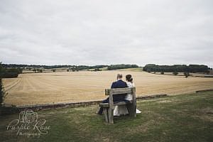 Bride and groom sitting alone for a quiet moment