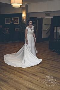 Bride laughing on the dance floor