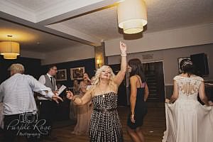 wedding guest dancing