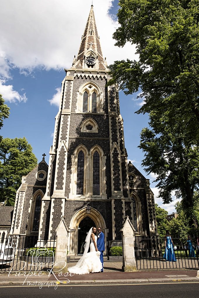 Bride and groom outside their church