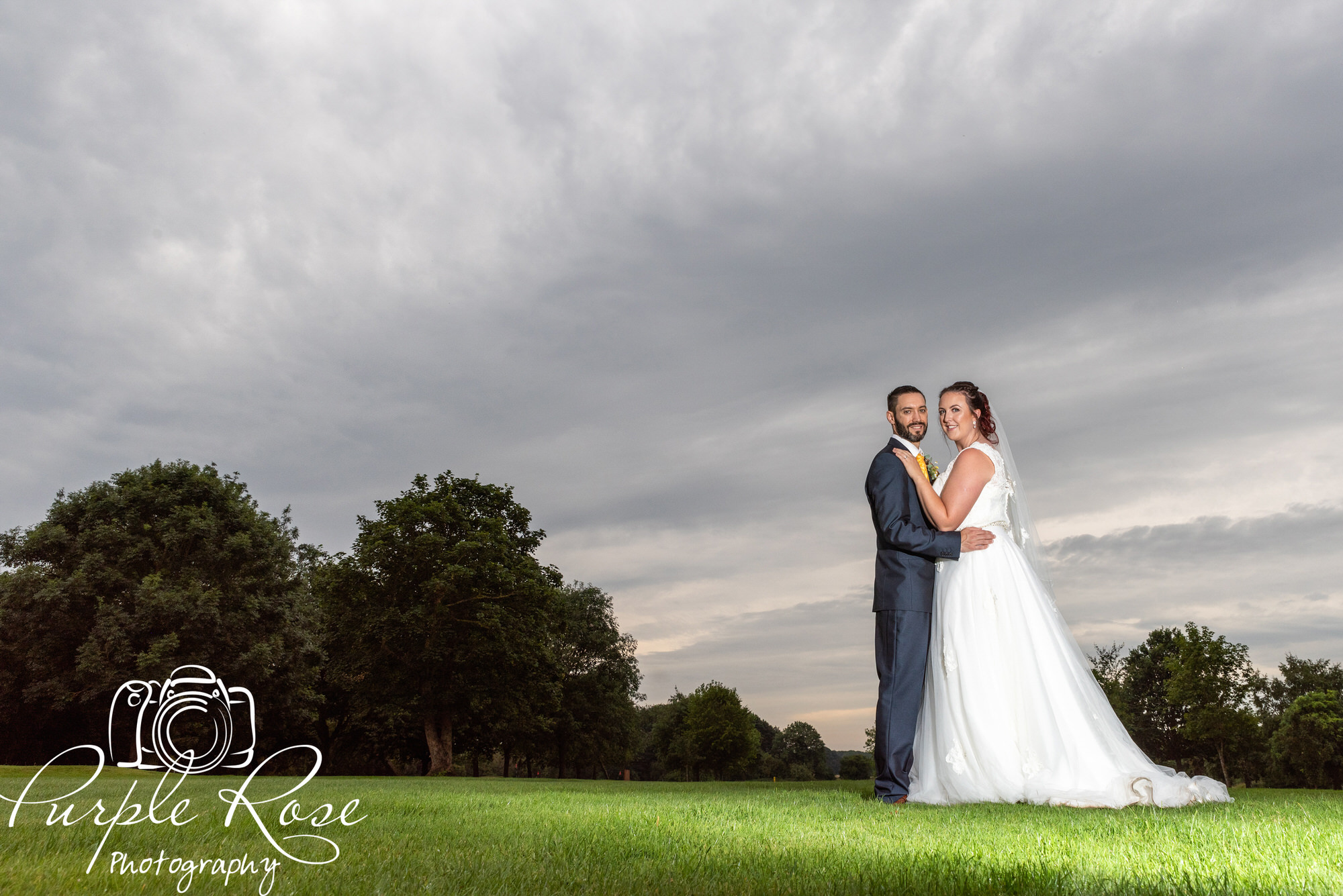 bride and groom at sunset