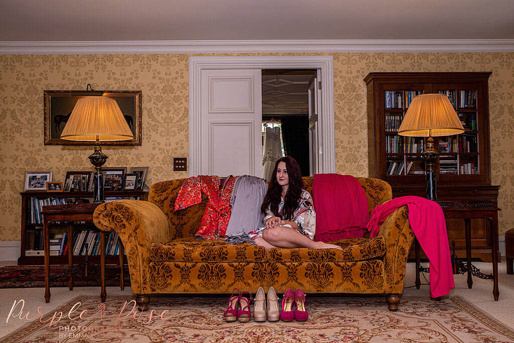 Bridesmaid relaxing on a sofa