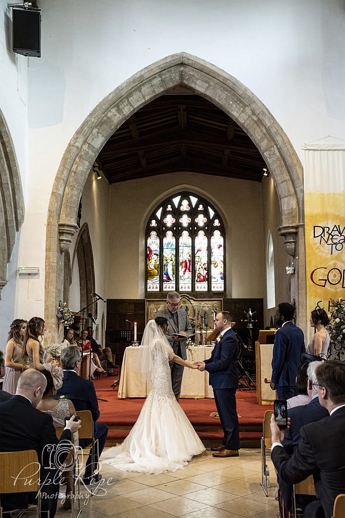 Bride & groom during their wedding ceremony