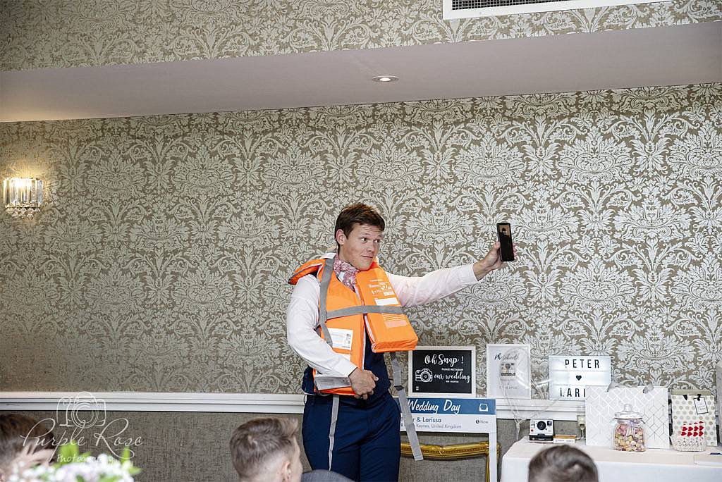 Best man giving a safety speech at wedding