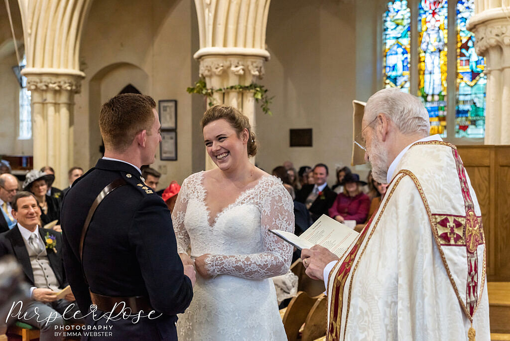 Bride and groom holding hands