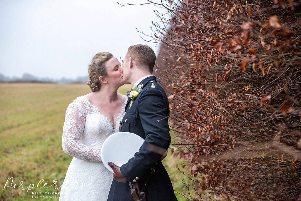 bride and groom kissing