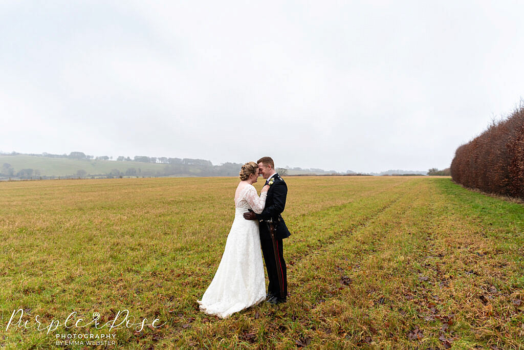 bride and groom embracing