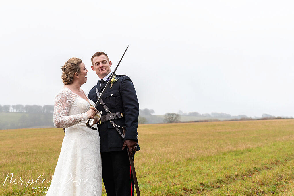 bride and groom messing around