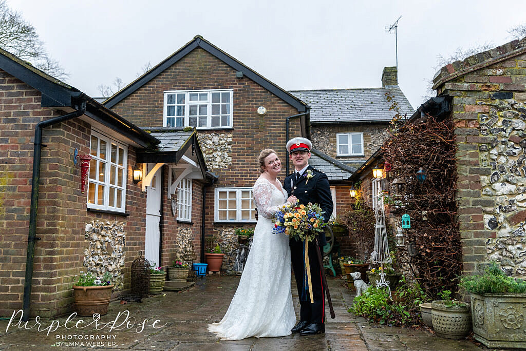 Bride and groom in a courtyard