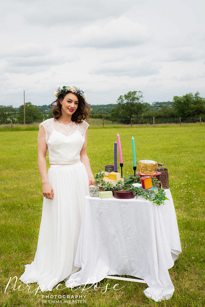 Bride standing by her cheese platter