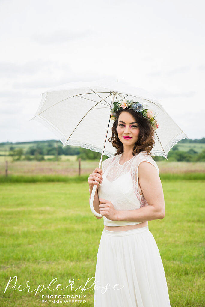 Bride holding an umbrella