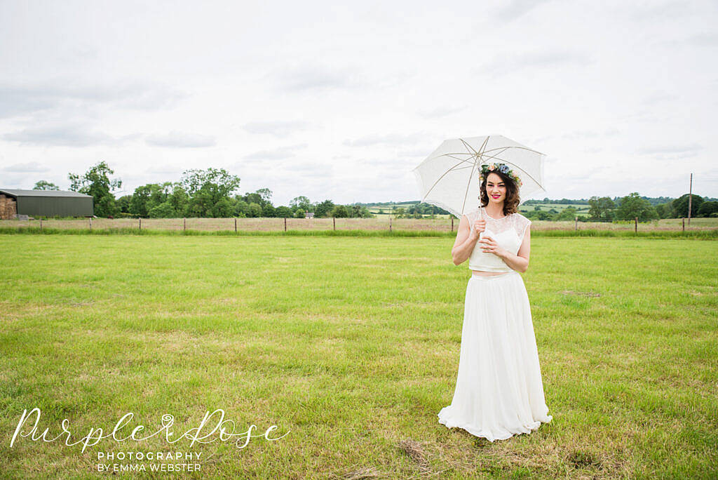 Bride with a white umbrella