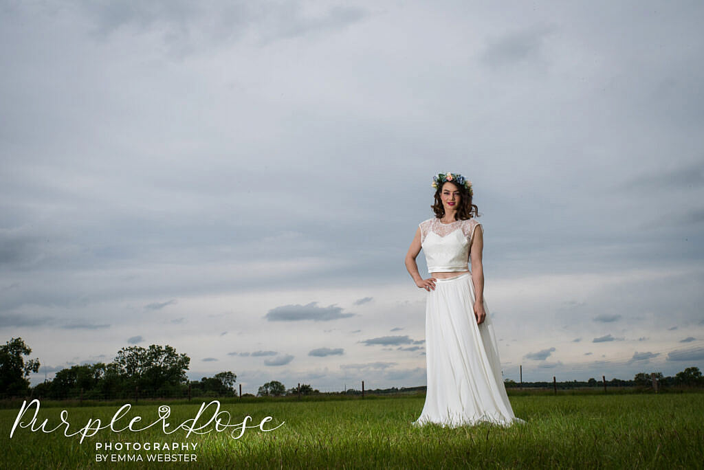 bride with stormy sky behind her