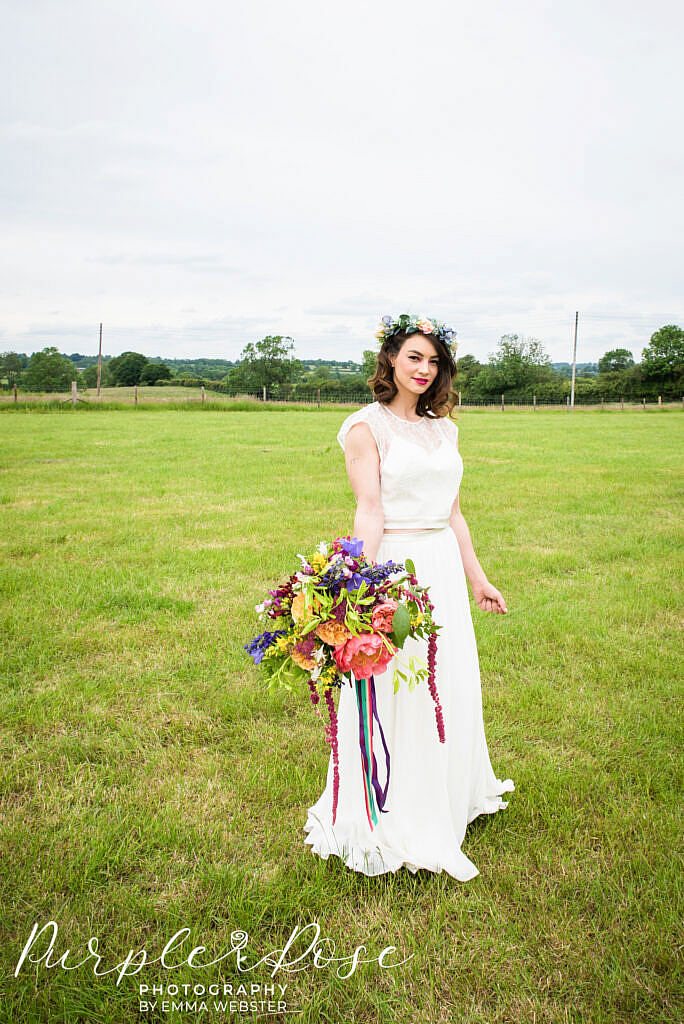 bride standing with her flowers